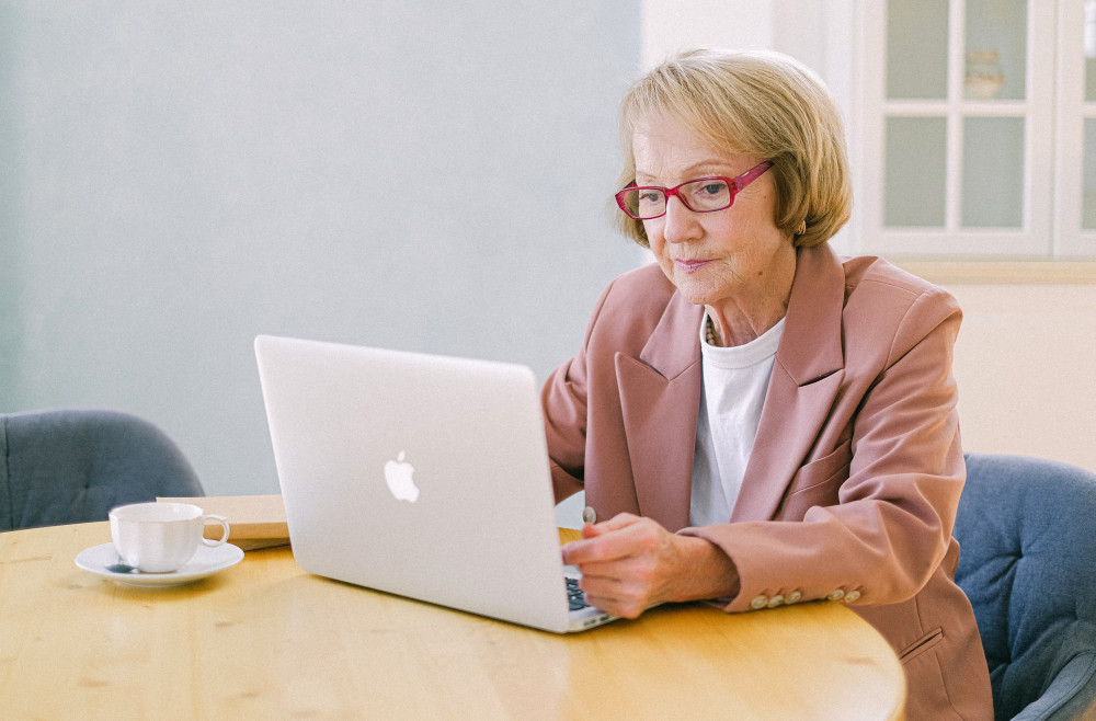 senior entrepreneur laptop pc